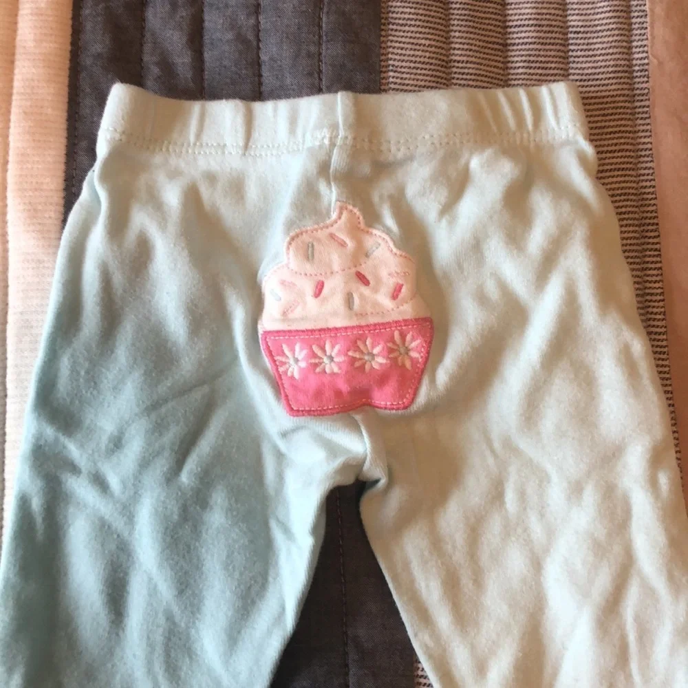 Two pairs of 3m Carter’s pants